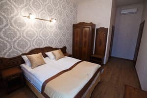 Мини-отель Inn Lviv. Семейный 4-местный люкс с двумя спальнями 5